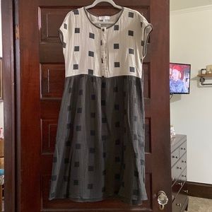 Piper and Scoot midi dress. Top half buttons almost a cap sleeve